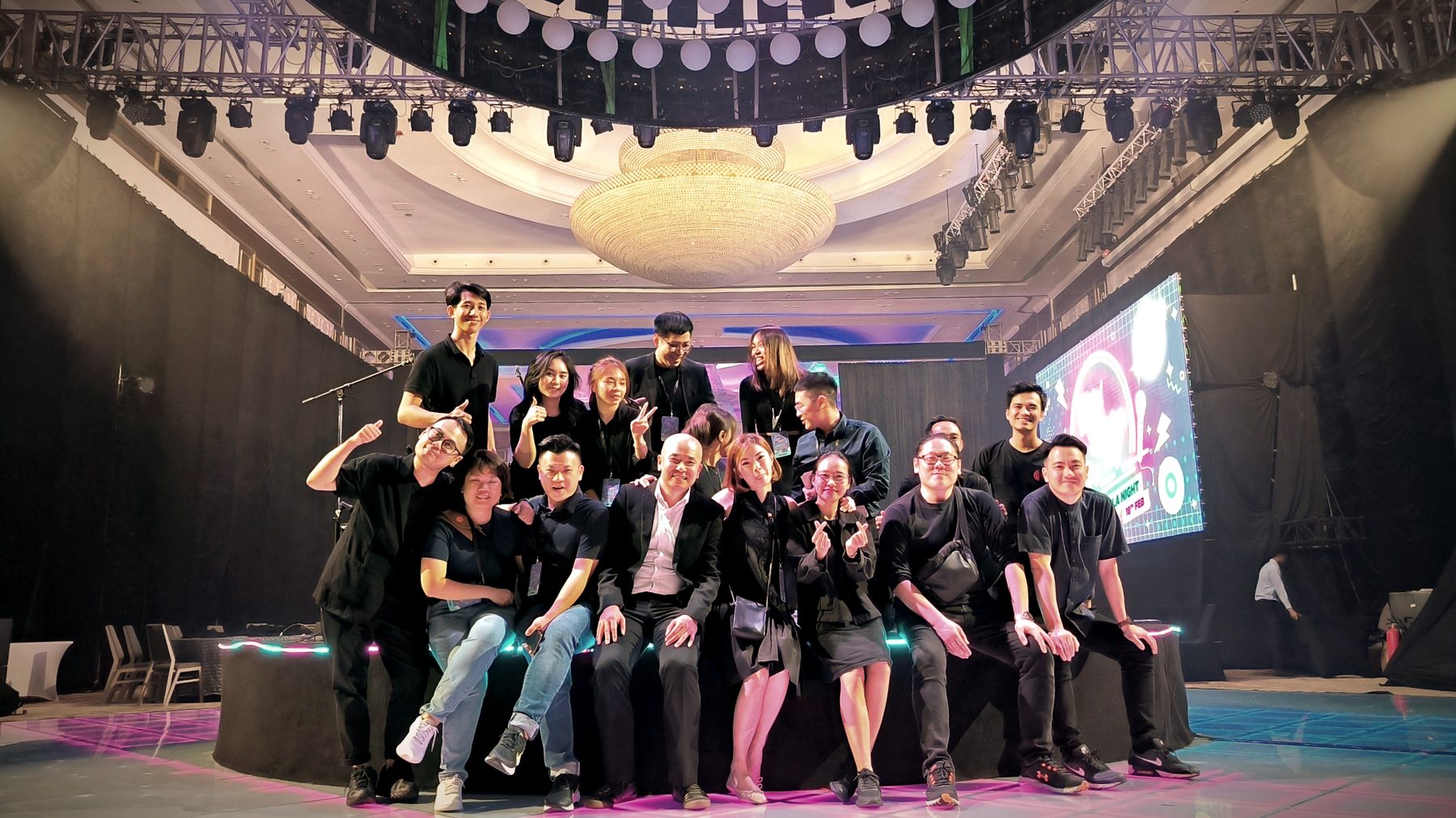 Crew group photo on the empty stage after the Global Markets Day gala