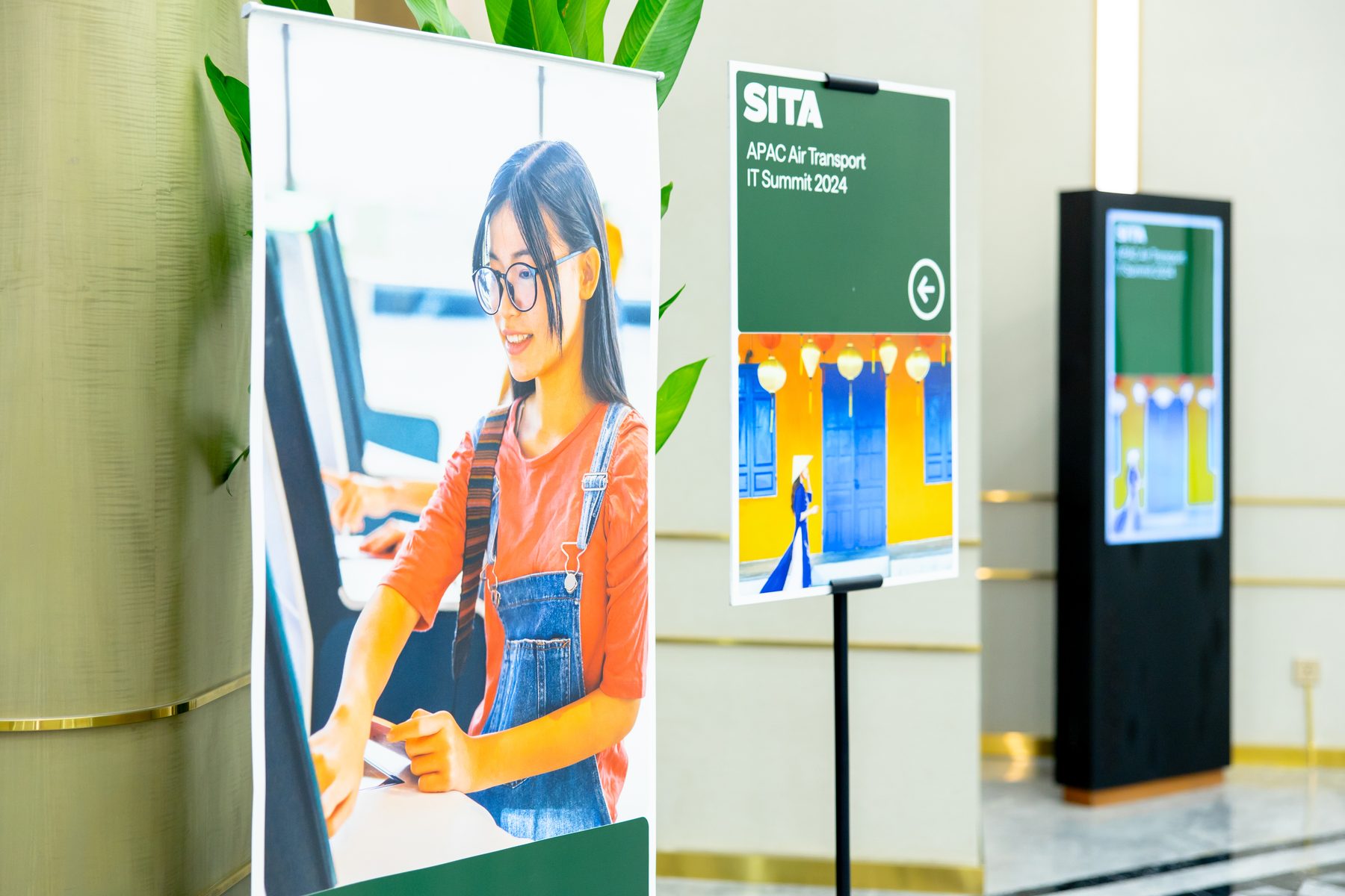 Wayfinding banner and registration signage for the SITA summit foyer